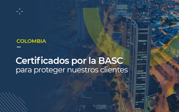 Sobre una foto de una moderna Bogotá, se puede leer COLOMBIA, certificados por la BASC para proteger nuestros clientes